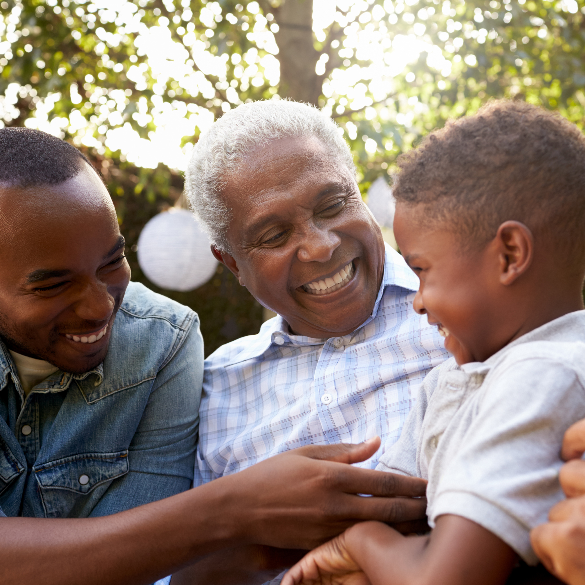 grandfather, father and young son